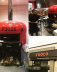 A bright red Napoli fired oven with a custom branded tiling for Fuoco.