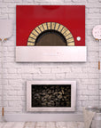 Milano fired oven with a red finish enclosed within a decorated brick wall.